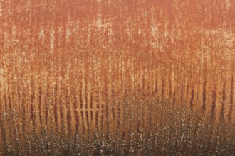 Close-up of cylindrical metal surface with rust stains and streaks, Quebec, Canada, North America