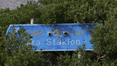 Signpost, Chora Sfakion, bullet holes, Frangokastello, Venetian fortress, castle, Sfakia, West