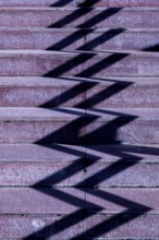 Shadow of a Railing on the Staircase in Italy