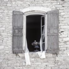 Quarry stone house with open window with shutters, Provence, France, Europe