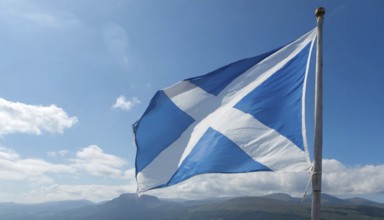 The flag of Scotland flutters in the wind