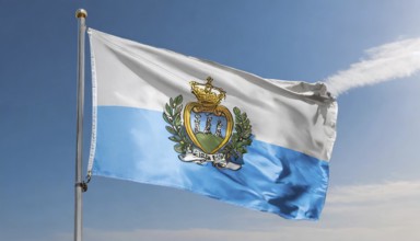 Flags, the national flag of San Marino flutters in the wind