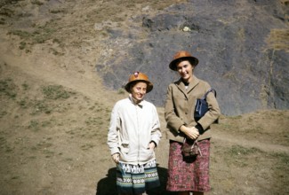 Mining at Cerro de Pasco, Peru, South America, around 1962 two female tourists with safety helmets