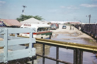 Bus at the ferry terminal for crossing the Rio Magdalena river, Barranquilla, Colombia, South