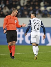 Referee Morten Krogh (DEN) in discussion with Pedro Porro Tottenham Hotspur Spurs (23) Gesture