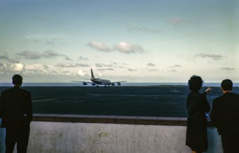 People looking at an aeroplane on the airport runway, Ponta Delgado, São Miguel Island, Azores,