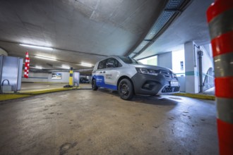 Vehicle parked in the multi-storey car park in a modern interior, ZOB car park of Stadtwerke Calw,