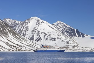 Antarctic cruise ship MV Sea Spirit of Poseidon Expeditions in Magdalenefjorden, fjord in Albert I