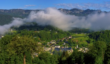 Morning fog over the village of Berchtesgaden in the valley, Berchtesgaden National Park, Upper