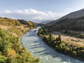 Mountain landscape with river in a narrow mountain valley in autumn, Little Naryn or Kichi-Naryn,