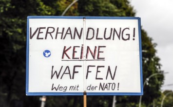 Poster at the demonstration of the alliance Never again war on the Day of Unity in Berlin, 03.10