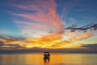 Longtail boat in sunset, sunset, horizon, evening light, boat, sun, evening mood, cloudy sky,