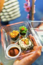 Sushi in a plastic box, market, evening market, food, nutrition, fish, snack, Asian, plastic, box,