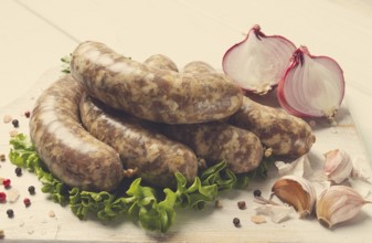 Raw kupaty, traditional Georgian sausages, raw sausages, with spices and herbs, Georgian cuisine