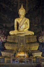 Golden Buddha statue, Bhumispara-mudra, Buddha Gautama at the moment of enlightenment, Wat