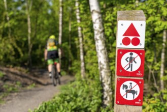 Signpost on the Brammentrail, mountain bike trail on the Schurenbach spoil tip, in Essen North