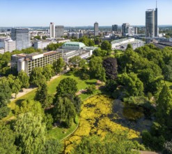 The skyline of Essen city centre, with the RWE Tower on the right and Stadtgarten Park in front,