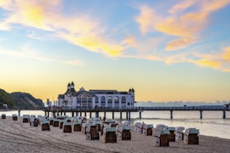 The pier of Sellin, evening mood, sunset, 394 metres long, with restaurant, jetty, beach chairs,