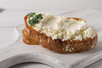 Sandwich, with cream cheese, homemade, on a cutting board, rustic style, no people, selective