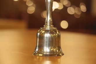 Close-up of a hand bell used, for example, in meetings, committees or courtrooms (here: council