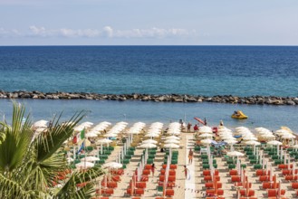 Beach with sunbeds and parasols on the Mediterranean in Sanremo, beach life, San Remo, Imperia,