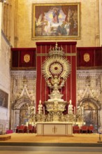 Magnificent altar with red and gold decorations, Seville