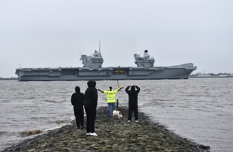 Aircraft carrier HMS Queen Elizabeth on the Elbe between Hamburg and the North Sea,