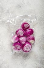 Red peeled onion, Spanish onion, sealed, for long-term storage, top view, no people