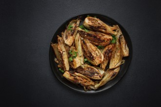 Baked, oven-baked fennel, with spices, in olive oil, homemade, no people