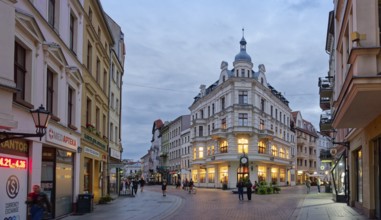 Szeroka Street in the medieval old town of Thorn, illuminated in the evening. The historic city