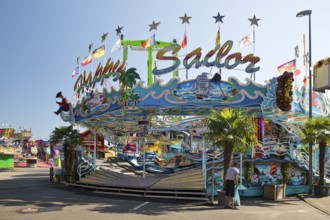 Everyday rubbish bag change at the Happy Sailor ride, funfair in the morning, Cranger Kirmes,