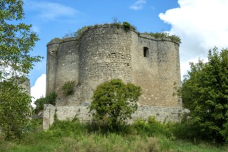 Medieval 13th century castle in Montaigu-le-Blin, showcasing impressive fortifications and