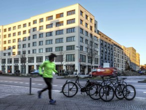 A jogger in the Europacity Berlin development area on Heidestrasse. The Europacity project covers