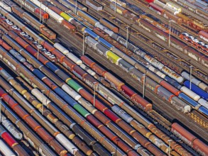 Deutsche Bahn AG marshalling yard. Many goods trains are parked on the tracks with tank wagons, car