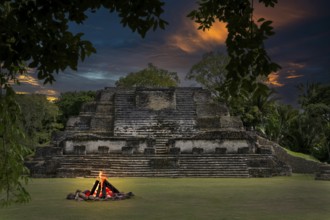 Campfire in front of pyramid Altun Belize Central America Fire Via KI