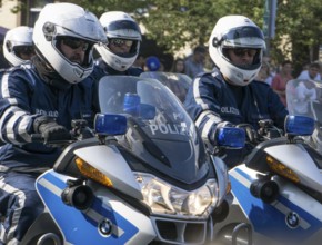 Berlin police officers from the motorbike squadron during a column ride at the Berlin police open