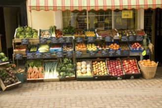 Display of fresh vegetables outside greengrocers shop, Halesworth, Suffolk, England, United