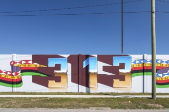 Detroit, Michigan, Detail of a mural that stretches for several blocks, by artist Hubert Massey.