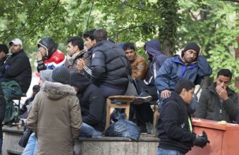 Refugees from Syria waiting to be registered at the Central Reception Centre for Asylum Seekers at