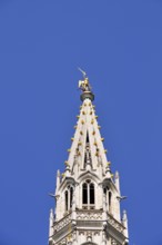 Gilded statue of the Archangel Michael fighting the dragon, the patron saint of the city of