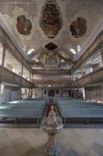 Interior of the organ loft, baptismal font in front1738 Inauguration of the baroqueised town church