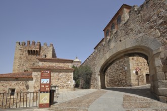 Historic archway Arco de la Estrella and part of the city fortifications, UNESCO Old Town, Caceres,