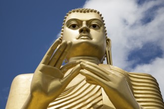 Giant Golden Buddha statue at Dambulla cave temple complex, Sri Lanka, Asia