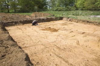 Archaeologists discover prehistoric field boundary ditch during excavation on new building plot,