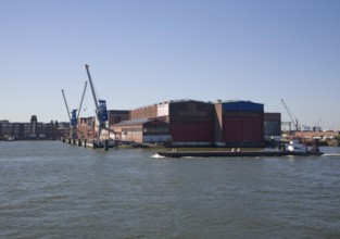 Cranes wharf warehouses Port of Rotterdam, Netherlands