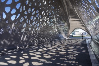 Light effects from the sun in the Parkbruk, a cycle and pedestrian bridge in the city centre of