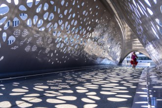 Light effects from the sun in the Parkbruk, a cycle and pedestrian bridge in the city centre of