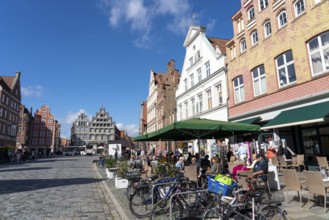 The old town centre of Lüneburg, central square Am Sande, with medieval gabled houses, building of