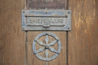 Letter box with city coat of arms, wooden door with fittings, inscription, metal, sheet metal,