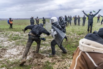 Violent clashes between thousands of demonstrators and the police, after a demonstration against